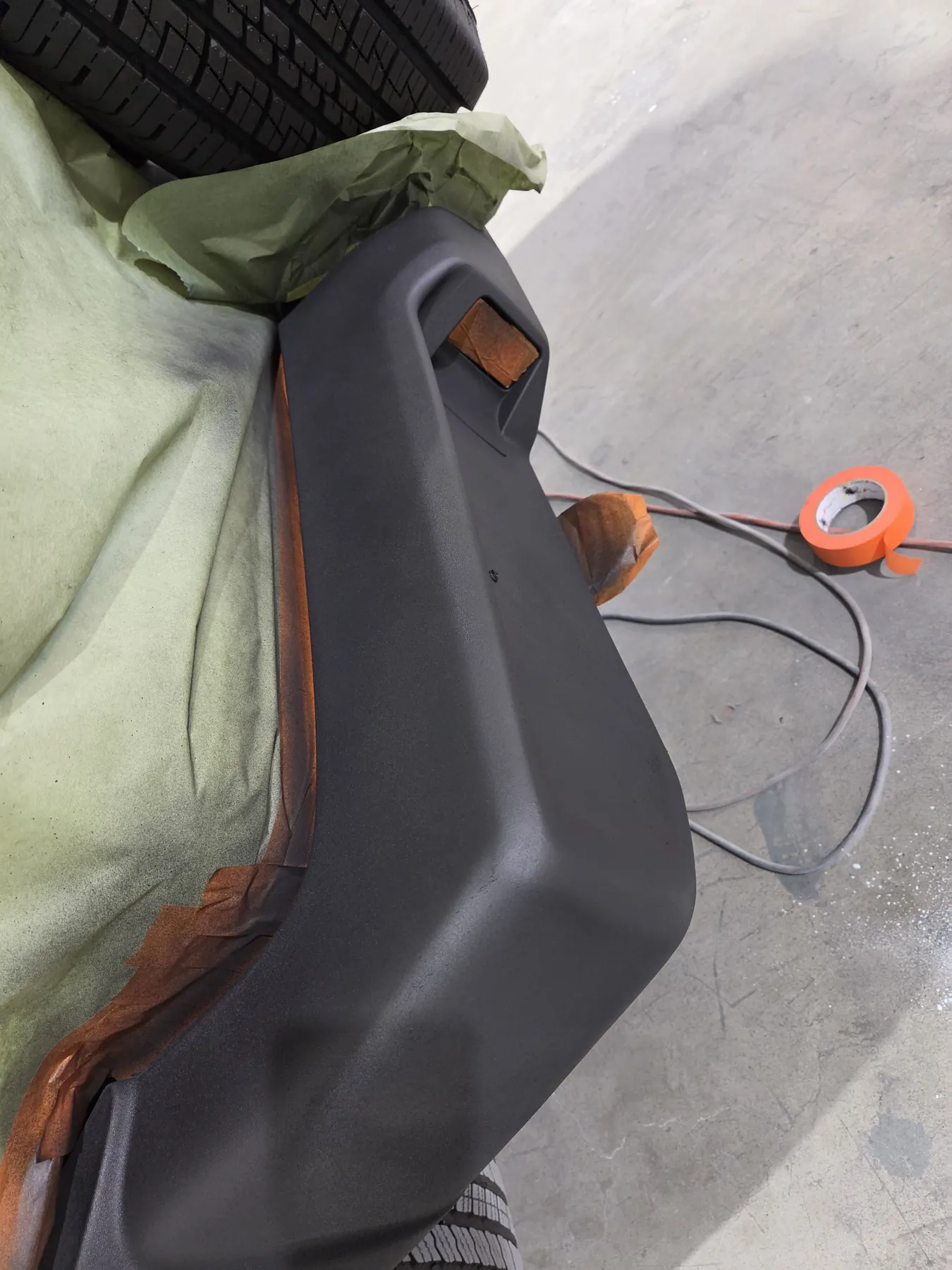 Jeep rear bumper masked during textured coating repair